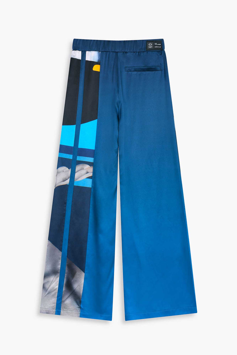 Vue de dos Pantalon 100% soie  bleu avec oeuvre de l'artiste SKIO "Riviera" 