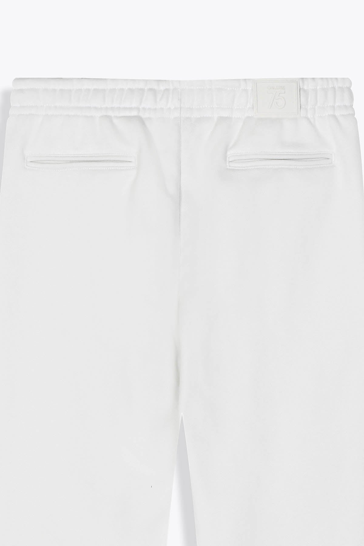 Pantalon blanc cassé Galerie 75 revers "Les amazones" de Skio