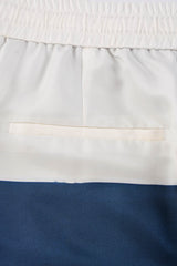 détail poche dos Pantalon homme en soie avec Œuvre “Guerrière” de Skio x Galerie 75