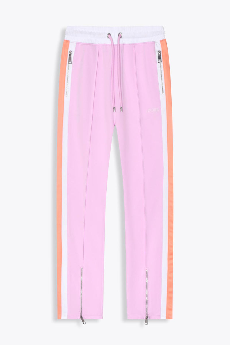 le pantalon de survetement rose et blanc